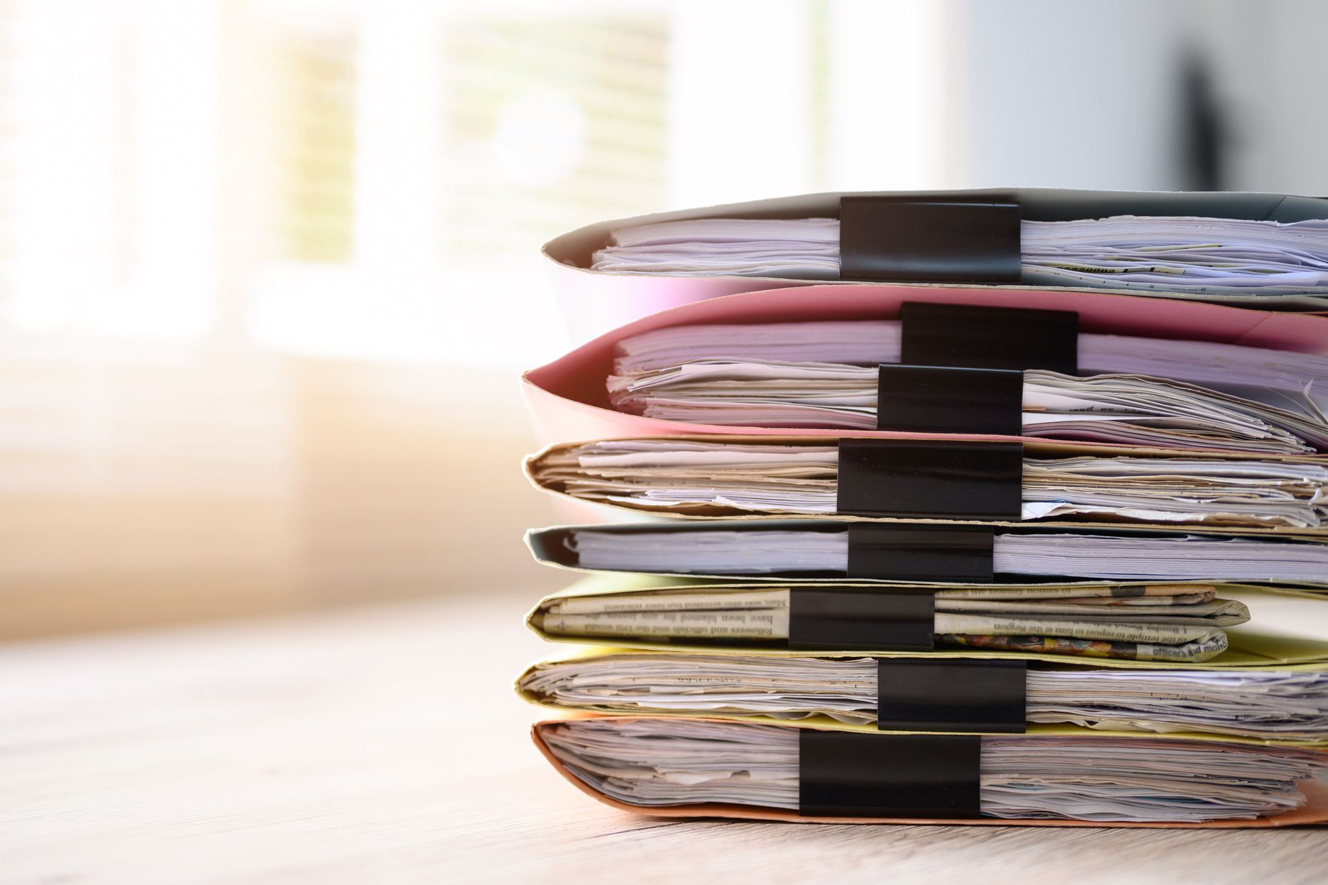 A stack of official documents in files