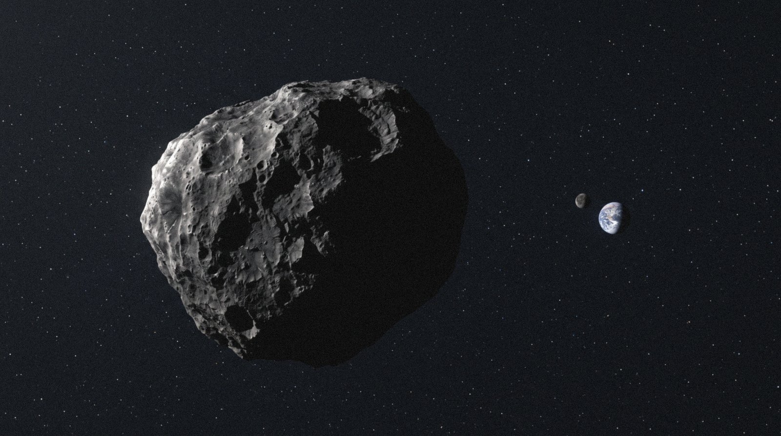 A dark cratered body in sunlight against the stars, a small blue world and its moon far off to one side